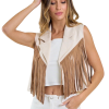 Discover rustic charm with our Sweet Tennessee Fringe Faux Suede Vest. Crafted with precision, this versatile vest blends Southern style and modern flair, featuring soft faux suede and delicate fringe details