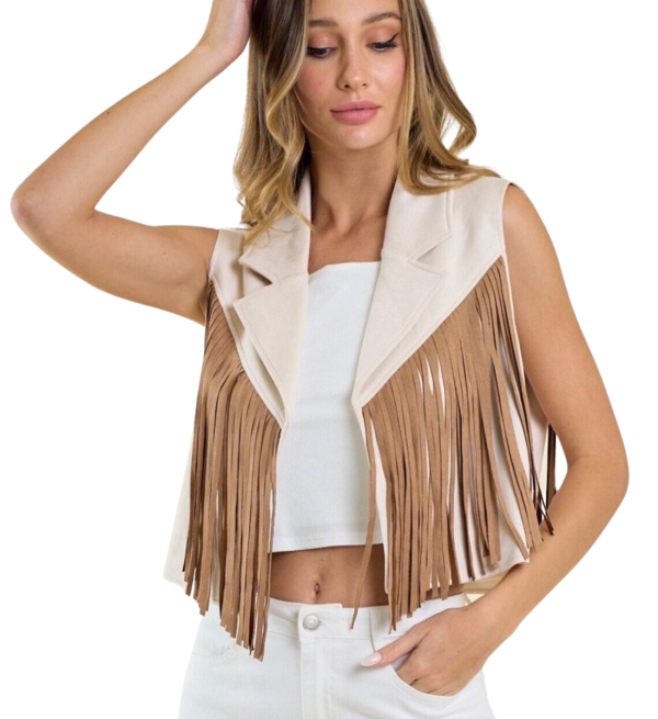 Discover rustic charm with our Sweet Tennessee Fringe Faux Suede Vest. Crafted with precision, this versatile vest blends Southern style and modern flair, featuring soft faux suede and delicate fringe details